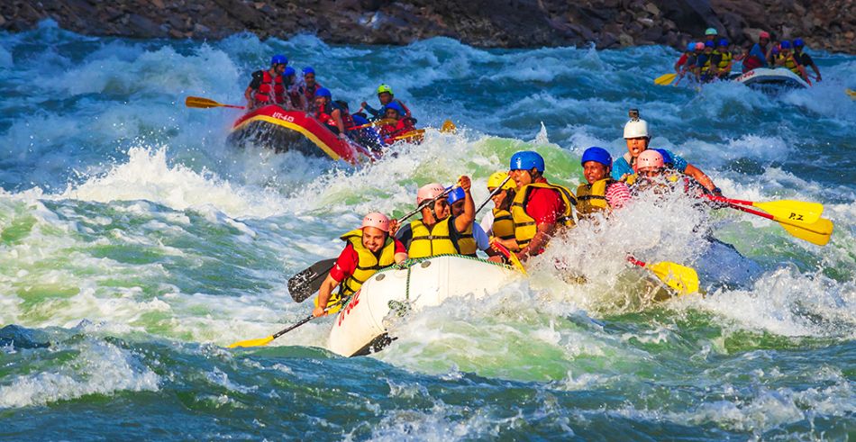 People enjoying white water rafting
